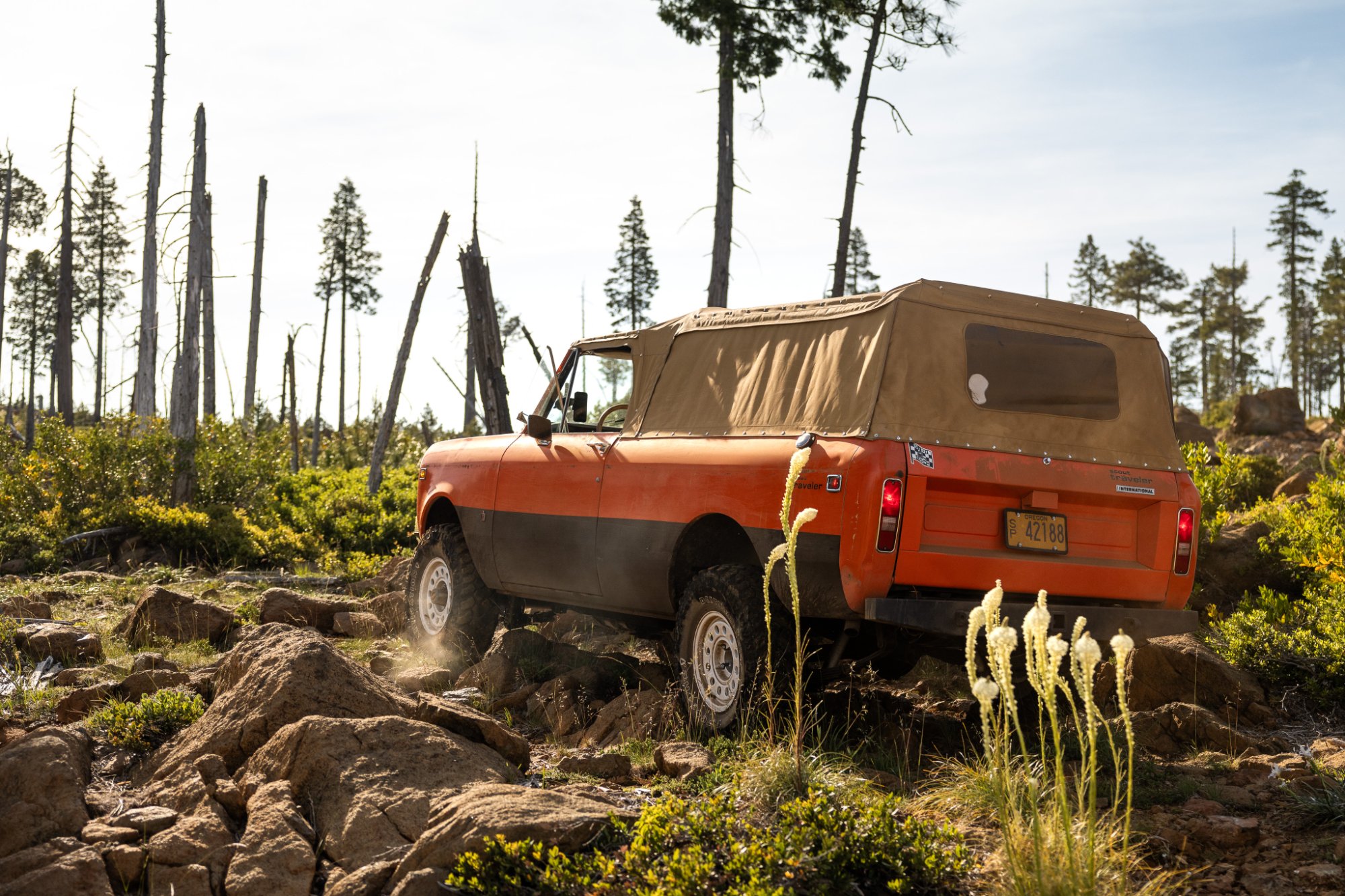 1976 Scout Traveler climbing rocky terrain